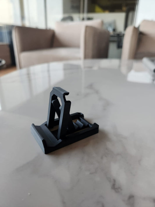 FlexiStand Keychain – Sleek Mobile Stand On-the-Go