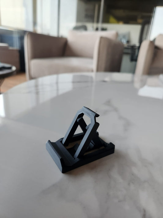 FlexiStand Keychain – Sleek Mobile Stand On-the-Go